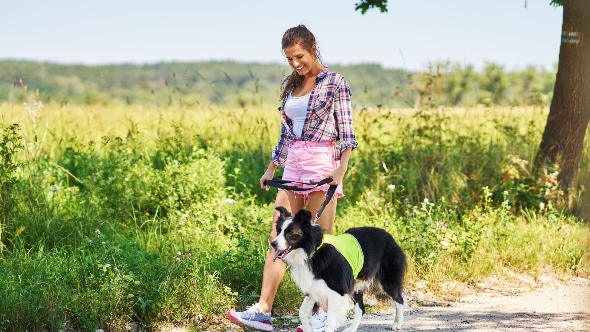 Woman walking dog
